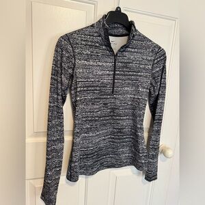 Nike Women's Black and White Striped Long Sleeve Top